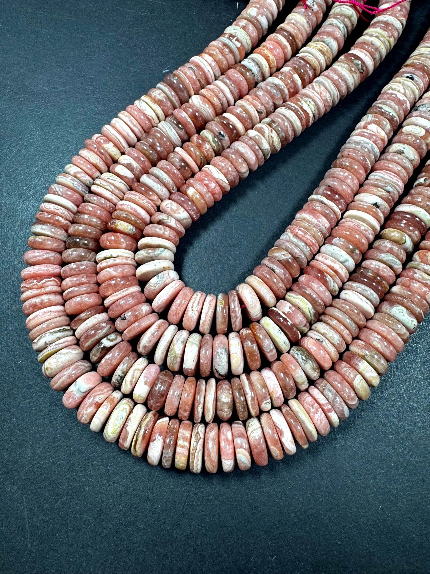 AAA RHODOCROSITE Gemstone bead. rondelle shape . gorgeous Natural Rose pink color . not treated. Excellent quality . full strand 15.5