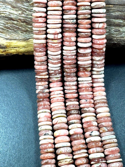 AAA RHODOCROSITE Gemstone bead. rondelle shape . gorgeous Natural Rose pink color . not treated. Excellent quality . full strand 15.5