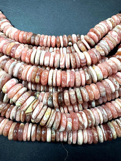 AAA RHODOCROSITE Gemstone bead. rondelle shape . gorgeous Natural Rose pink color . not treated. Excellent quality . full strand 15.5