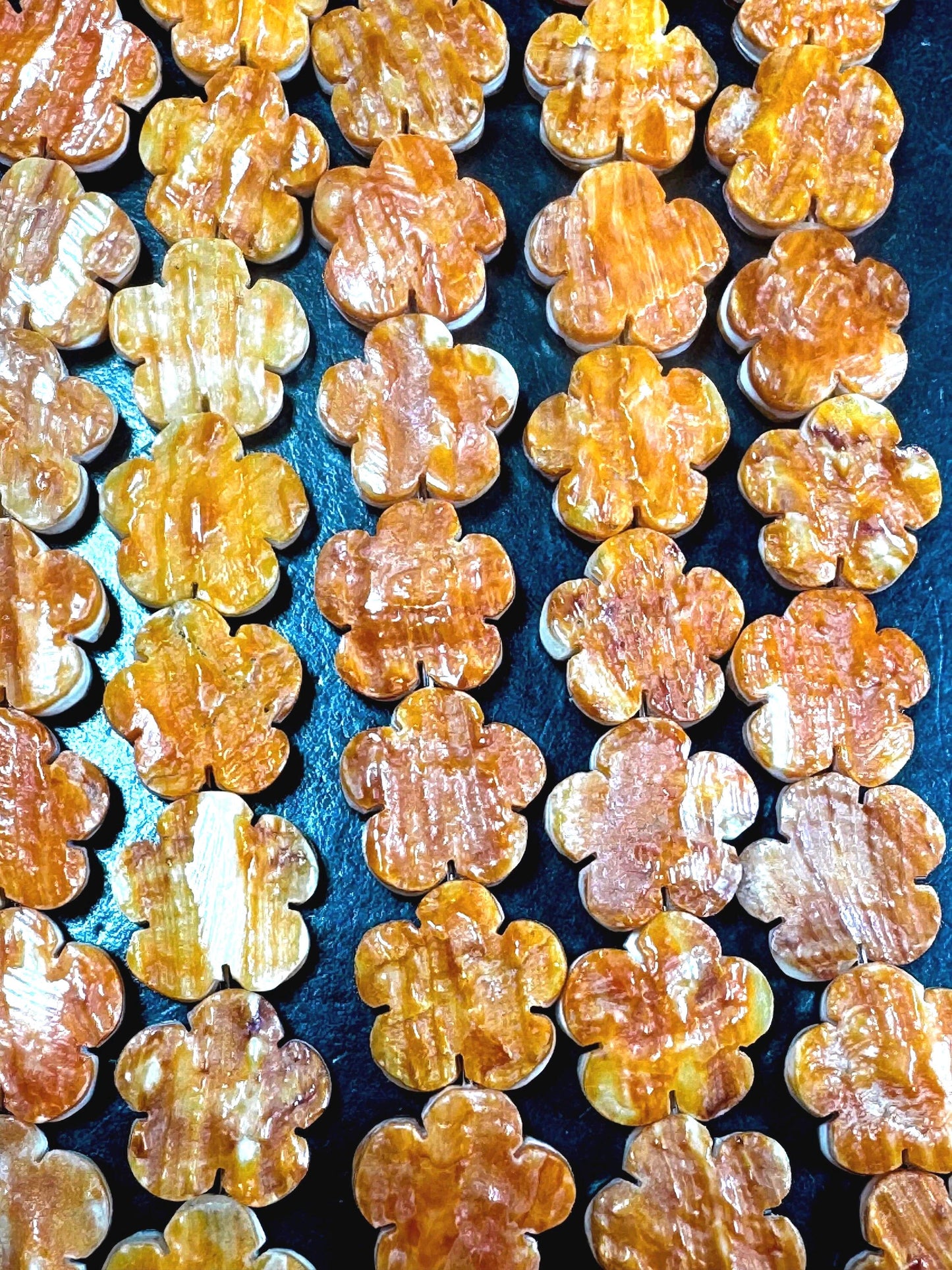 AAA Natural spiny oyster shell beads. Unique flower shape . Gorgeous natural orange yellow color . Excellent quality