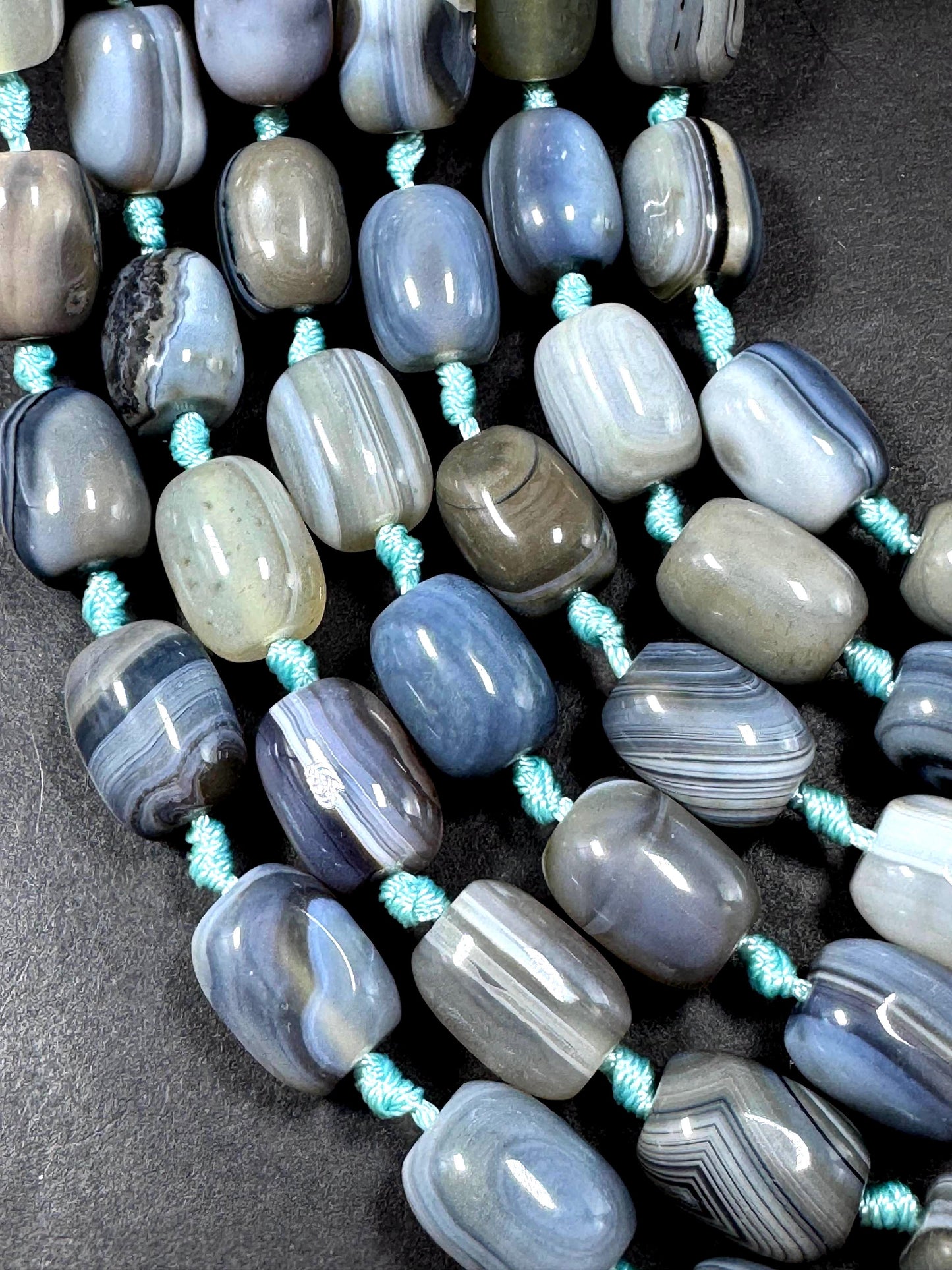 AAA Natural Botswana gemstone bead. Tuba shape. Beautiful Natural gray brown color. Not treated. Excellent quality. Full strand 15.5”