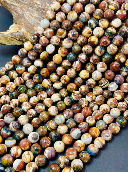 Beautiful Natural Hand painted Tibetan gemstone bead. 10mm round bead. Gorgeous unique brown blue multi color gemstone bead.