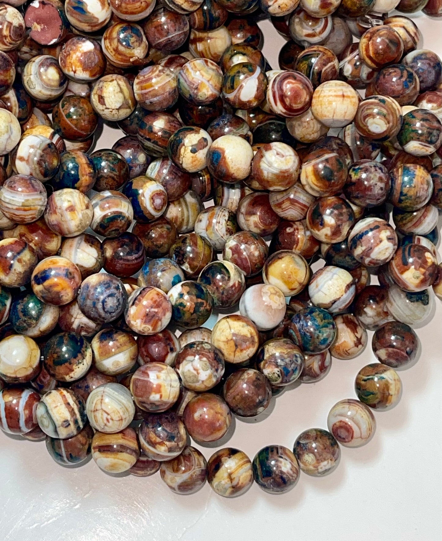 Beautiful Natural Hand painted Tibetan gemstone bead. 10mm round bead. Gorgeous unique brown blue multi color gemstone bead.