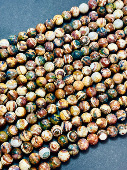 Beautiful Natural Hand painted Tibetan gemstone bead. 10mm round bead. Gorgeous unique brown blue multi color gemstone bead.