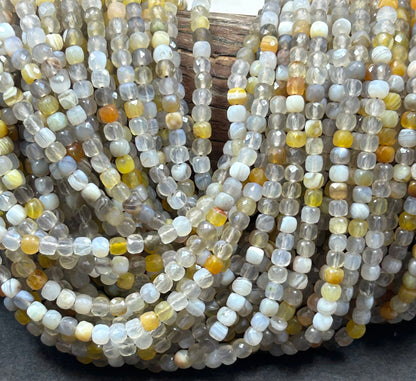 AAA Natural Yellow Botswana stone bead. Faceted 4mm cube shape bead. Beautiful natural yellow gray color gemstone bead. High quality bead !