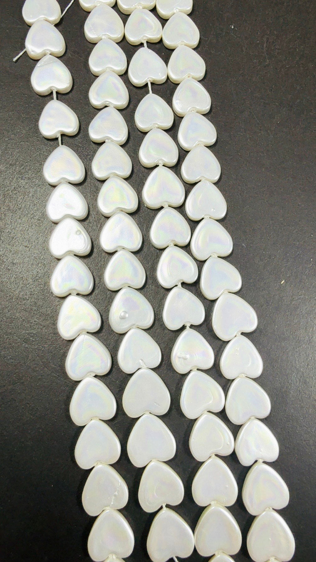 Natural Shell Pearl. Gorgeous Iridescent White color, 12mm Heart shape shell bead.Unique natural white shell bead. High quality bead!