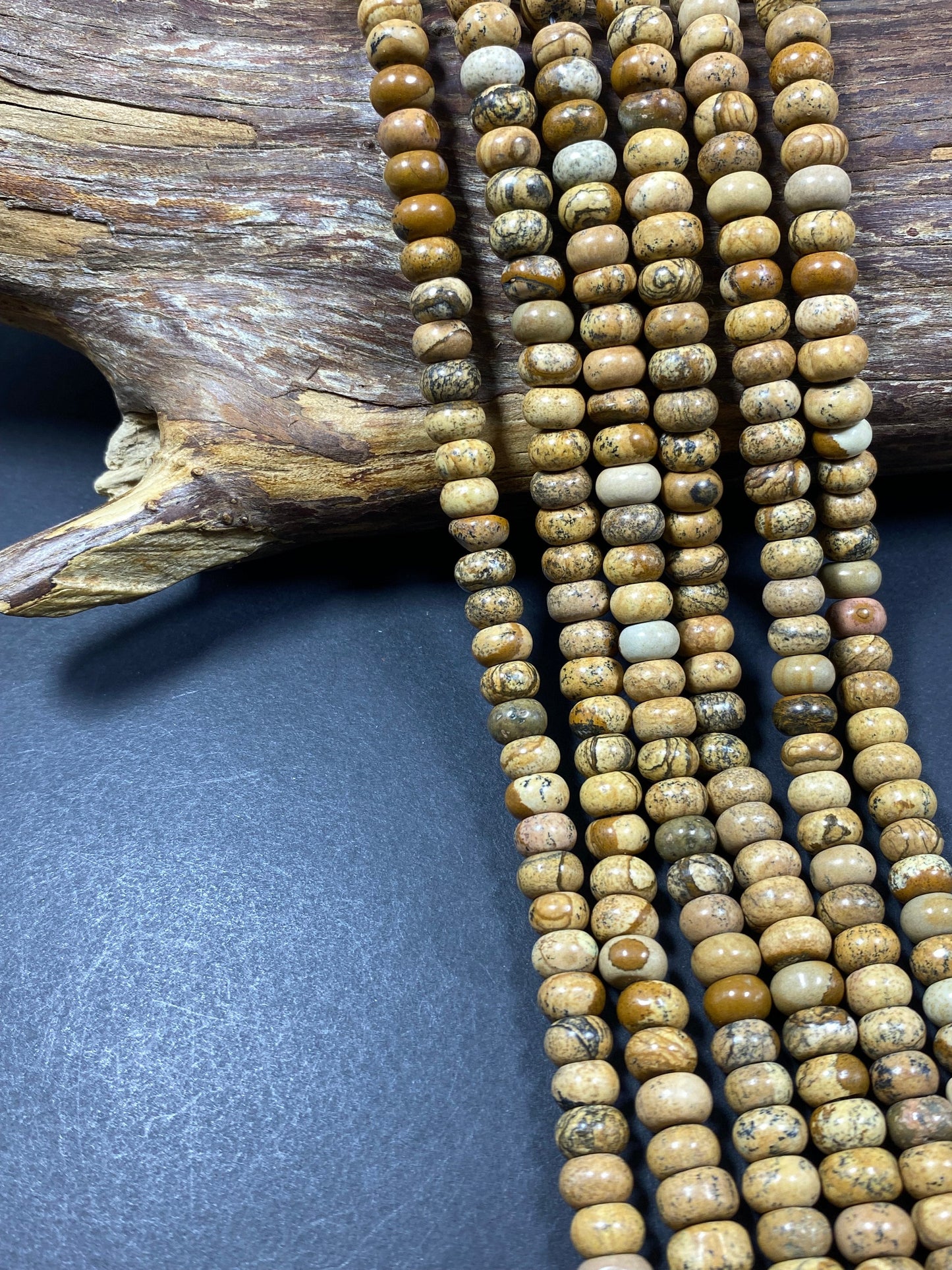 Natural picture jasper roundel stone bead. Faceted  5x9mm Rondell bead. Beautiful natural brown jasper gemstone. Full strand length 15''