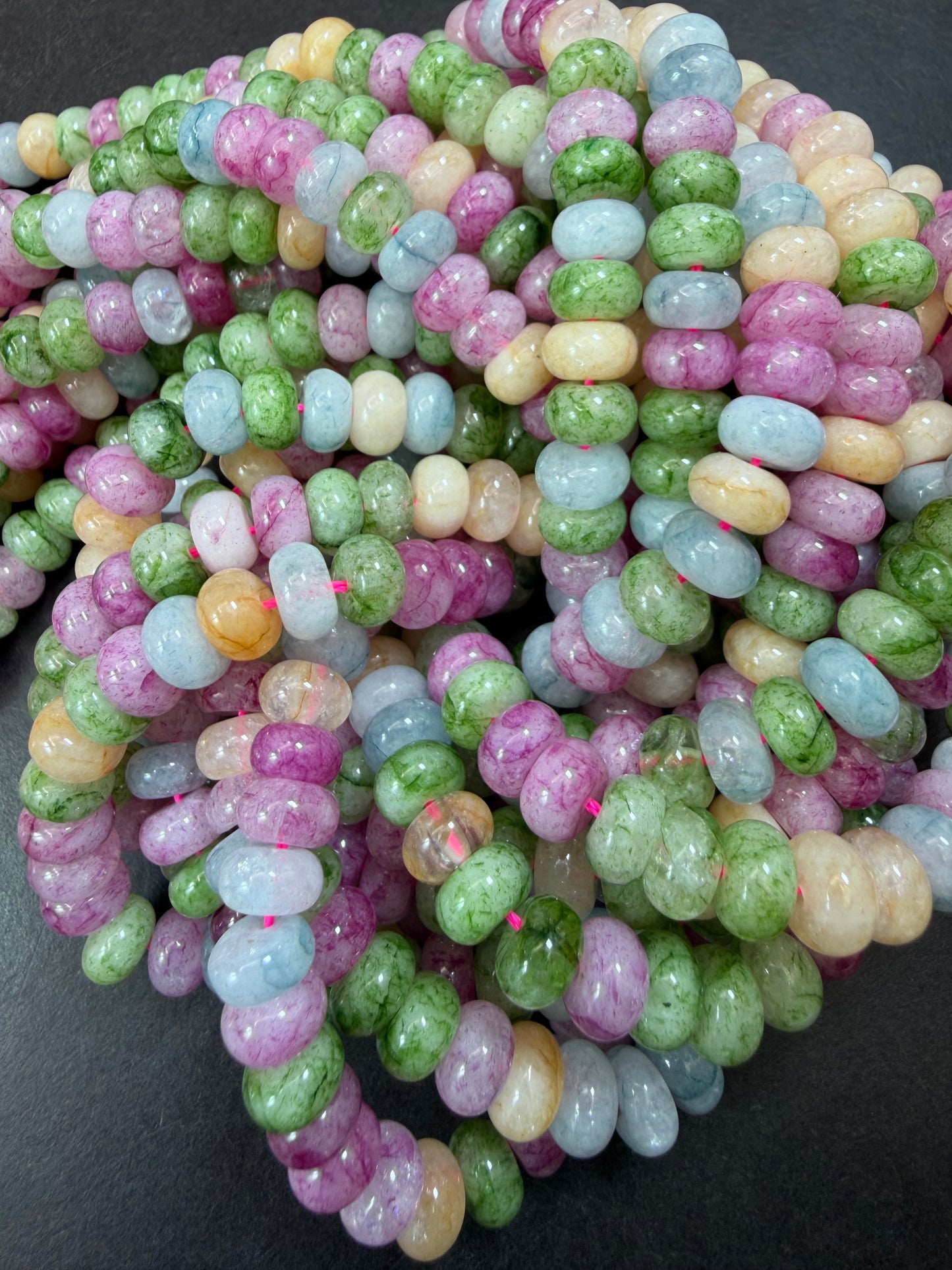 Natural gemstone bead. Multi color jade stone bead. 5x8mm smooth rondelle shape. Excellent quality. Full strand 15.5”.