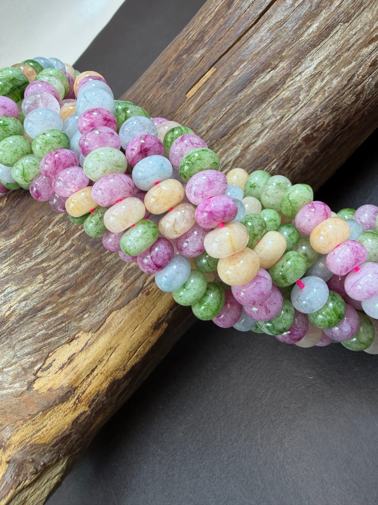 Natural gemstone bead. Multi color jade stone bead. 5x8mm smooth rondelle shape. Excellent quality. Full strand 15.5”.