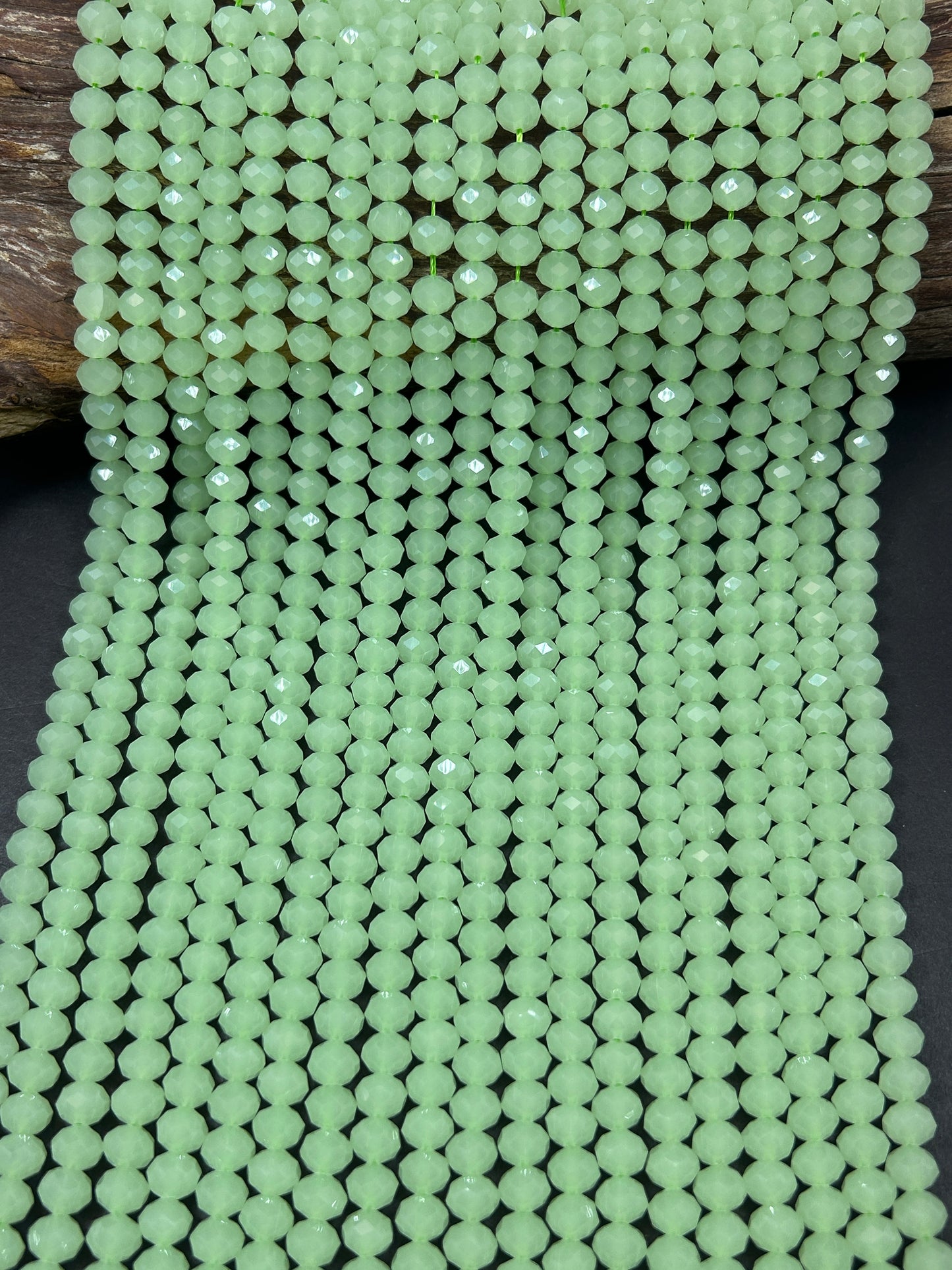 Beautiful Chinese crystal. Faceted Rondelle shape bead. Gorgeous spring green iridescent rainbow color. Great quality glass full strand