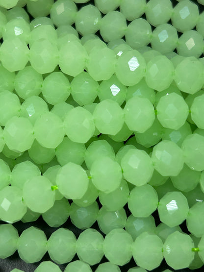 Beautiful Chinese crystal. Faceted Rondelle shape bead. Gorgeous spring green iridescent rainbow color. Great quality glass full strand