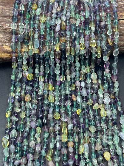 AAA natural fluorite gemstone bead. Freeform Smooth Pebble Shape bead. Gorgeous natural purple green yellow color fluorite bead. Loose bead