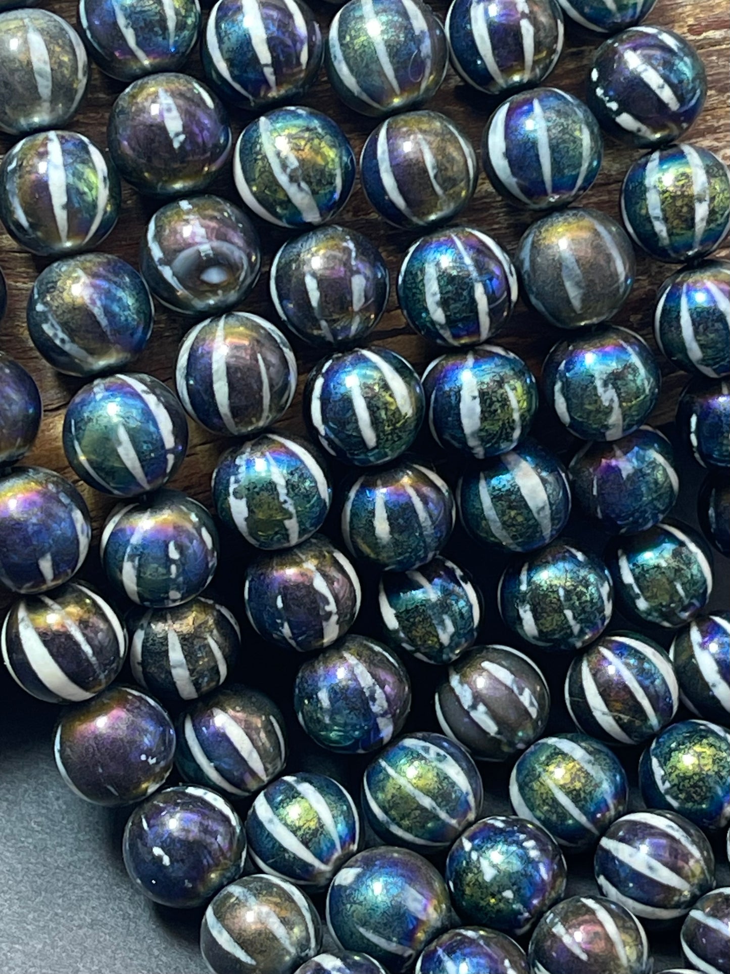 Mystic hand painted Tibetan Onyx 8mm 10mm round bead. Beautiful black rainbow hand painted design. Unique looking gemstone. Full strand 15"