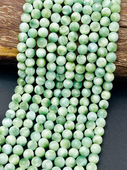 AAA Natural Green Moonstone bead 6mm 8mm 10mm round bead. Gorgeous rainbow natural green color moonstone bead. Excellent quality gemstone.