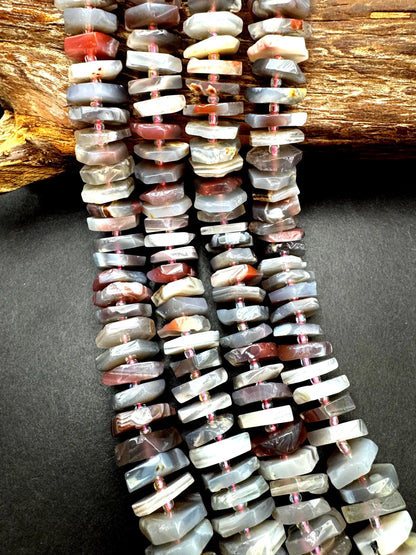 Natural Botswana gemstone bead. pinwheel shape . Gorgeous natural pink purple grayish color. Full strand 15.5”