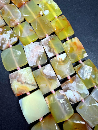 Natural cherry blossoms agate gemstone bead. Gorgeous natural pinkish color. Not treated. Excellent quality . Full strand 15.5