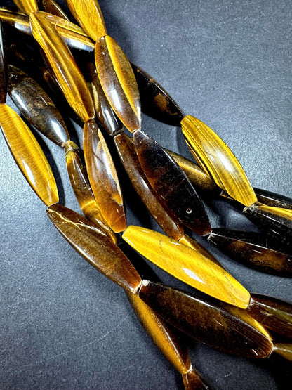 Natural tiger eye gemstone bead. Large oval shape . Natural brown yellow color. Full strand 15.5