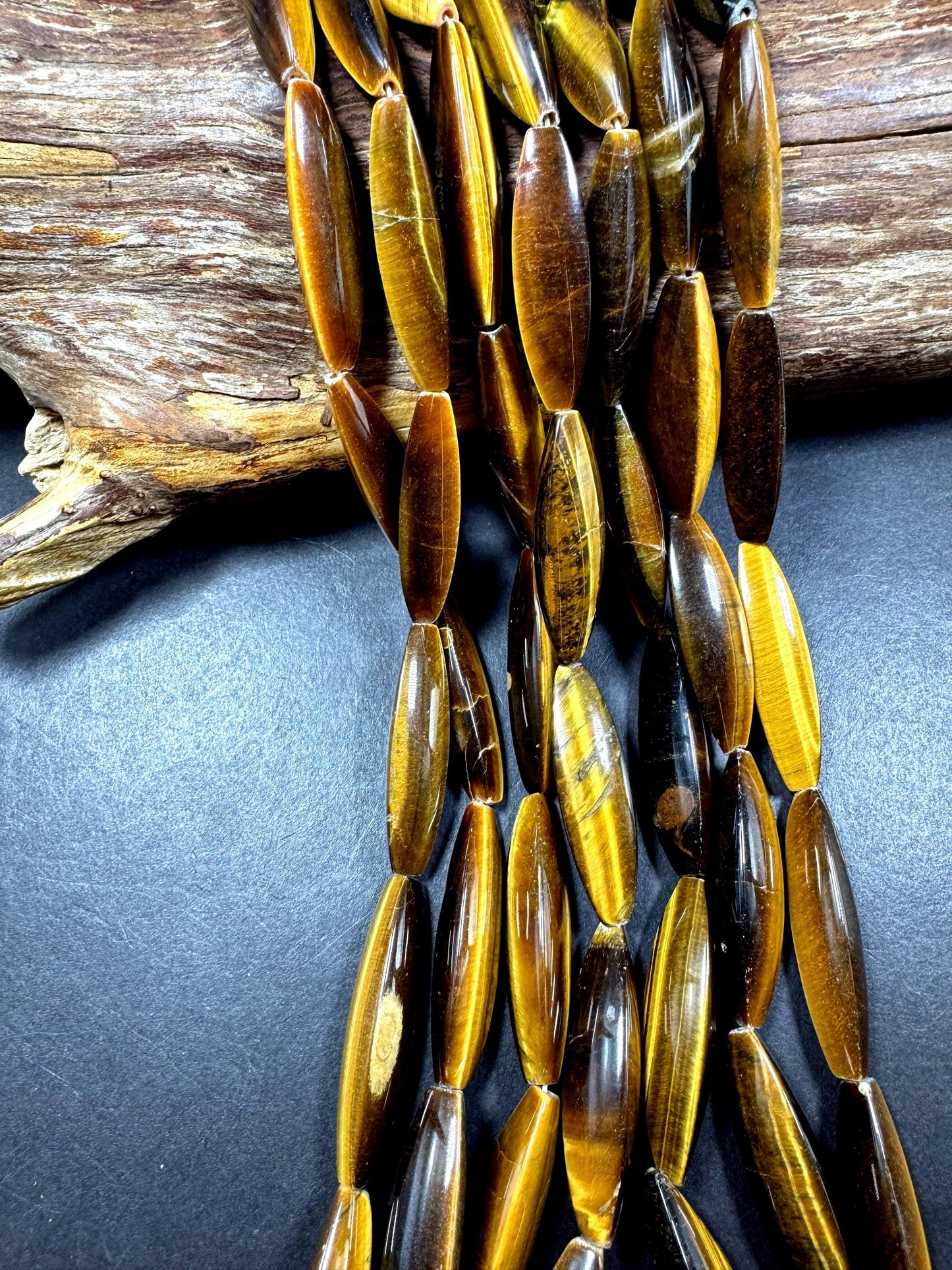 Natural tiger eye gemstone bead. Large oval shape . Natural brown yellow color. Full strand 15.5