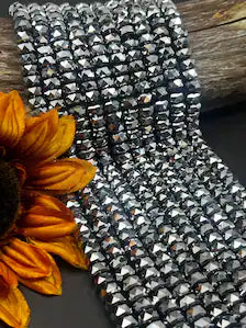 Metallic Silver great quality. Beautiful Chinese crystal faceted Rondelle shape. 10x6mm Full strand.