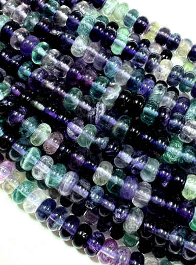 Natural fluorite gemstone beads. Rondelle shape . Gorgeous natural color. Not treated. Excellent quality. Full strand 15.5”