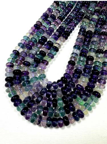 Natural fluorite gemstone beads. Rondelle shape . Gorgeous natural color. Not treated. Excellent quality. Full strand 15.5”