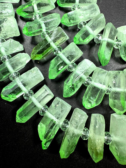 100% Natural Rock Crystal quartz . freedom teeth shape . Pear green color . full strand 15.5