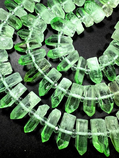 100% Natural Rock Crystal quartz . freedom teeth shape . Pear green color . full strand 15.5