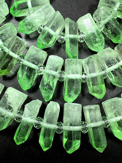 100% Natural Rock Crystal quartz . freedom teeth shape . Pear green color . full strand 15.5