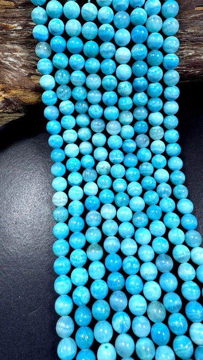 Beautiful Natural Hemimorphite gemstone beads. Smooth round beads. Excellent quality . Full strand 15.5"
