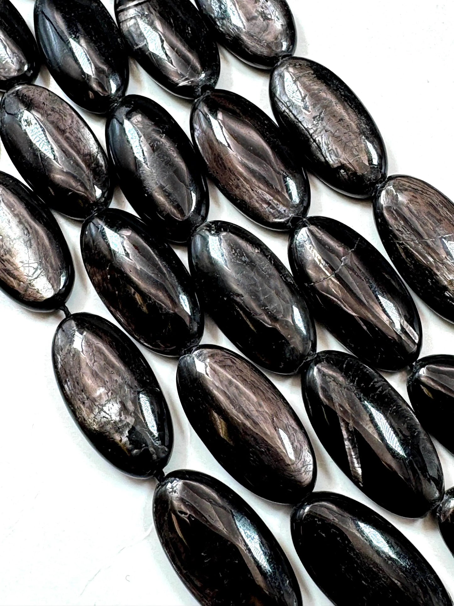 Natural Hypersthene Gemstone Beads: Black Oval Shape Rainbow Flash, 15.5" Strand