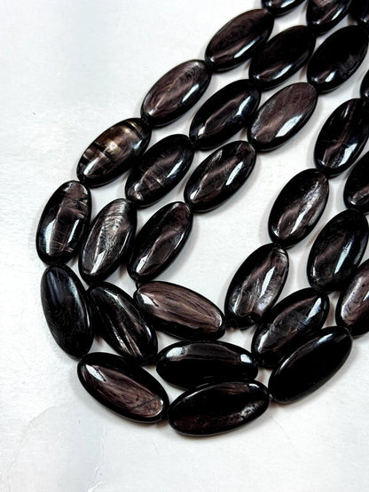 Natural Hypersthene Gemstone Beads: Black Oval Shape Rainbow Flash, 15.5" Strand