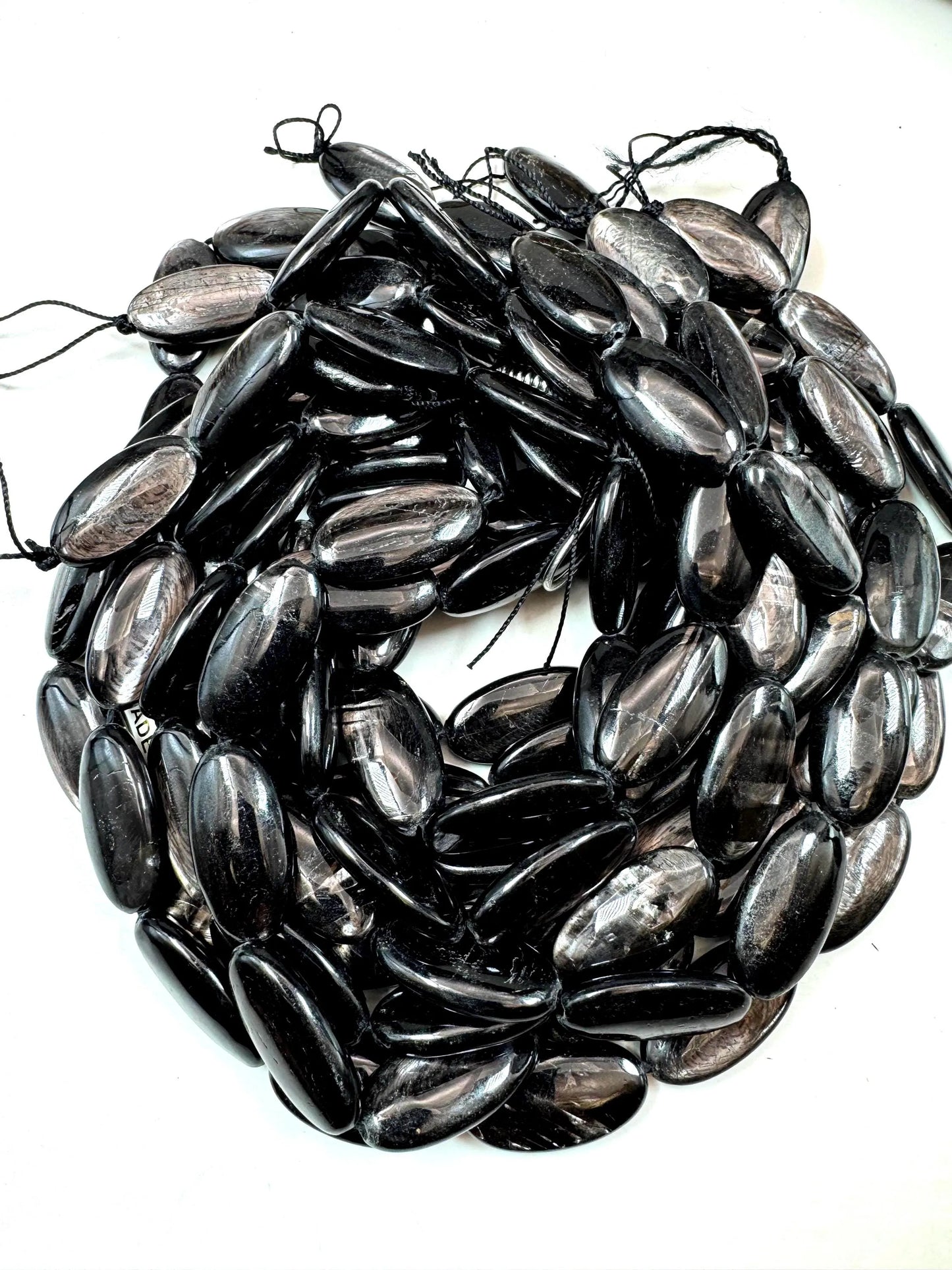Natural Hypersthene Gemstone Beads: Black Oval Shape Rainbow Flash, 15.5" Strand