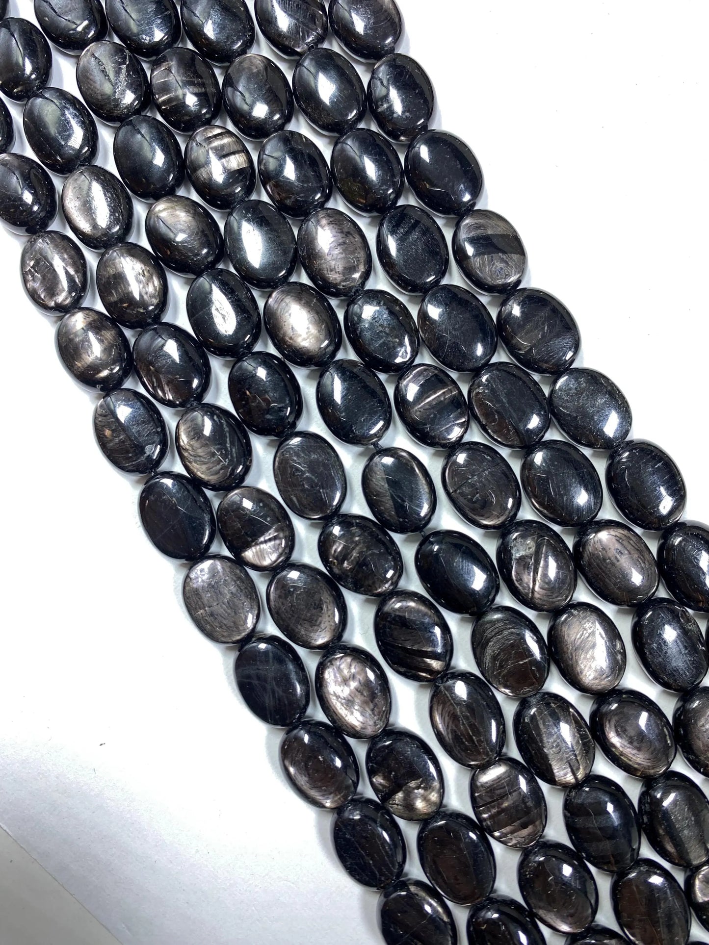 Natural Hypersthene Gemstone Beads: Black Oval Shape Rainbow Flash, 15.5" Strand