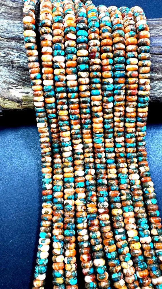 100% Natural turquoise with spiny oyster shell bead.  Rondelle shape . Gorgeous Natural blue orange color. Not treated ! Full strand 15.5”