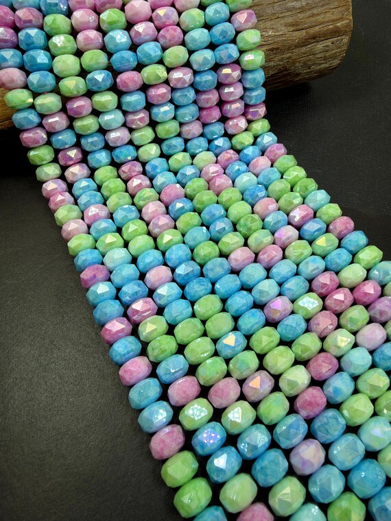 Beautiful Chinese Crystal Faceted Rondelle shape, Multicolor pink,blue,light green colors. Great Quality, Full Strand 15.5’.