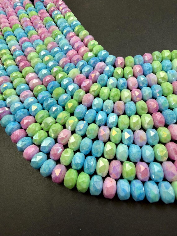 Beautiful Chinese Crystal Faceted Rondelle shape, Multicolor pink,blue,light green colors. Great Quality, Full Strand 15.5’.