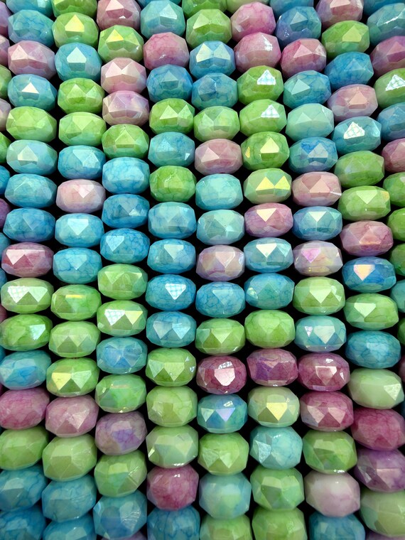 Beautiful Chinese Crystal Faceted Rondelle shape, Multicolor pink,blue,light green colors. Great Quality, Full Strand 15.5’.