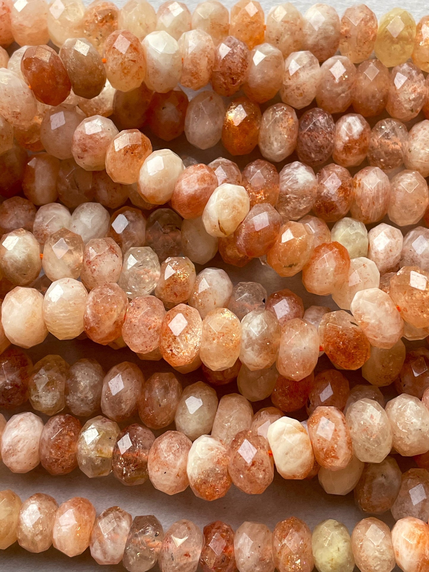 Natural fire sunstone bead. Faceted 5x7mm 6x10mm Rondelle bead. Gorgeous natural orange red fire color sunstone bead . Nice quality gemstone