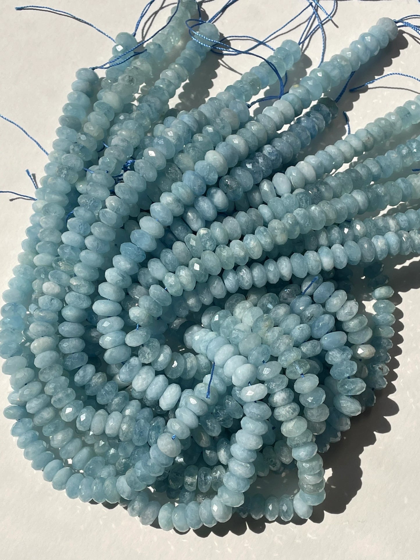 AAA Natural Blue Aquamarine Stone Bead. Faceted 4x7m, 5x8mm, 6x9mm, 6x10mm Rondelle Shape. Beautiful Natural Blue Color. Real Nice Quality!