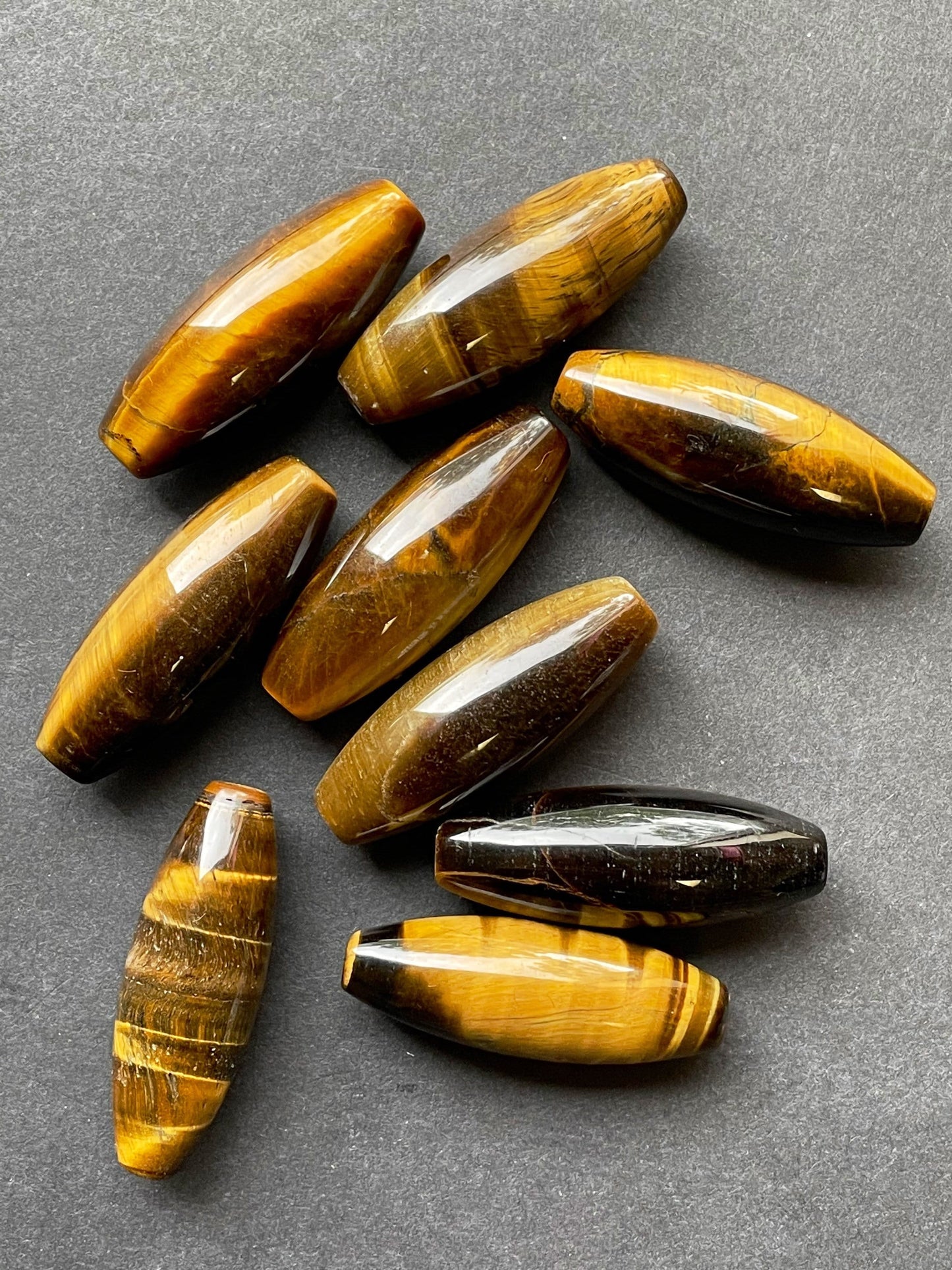 Beautiful natural tiger eye stone bead. 14x40mm barrel shape bead. Gorgeous natural golden yellow color tiger eye gemstone bead.