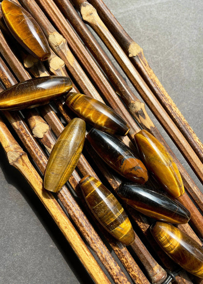 Beautiful natural tiger eye stone bead. 14x40mm barrel shape bead. Gorgeous natural golden yellow color tiger eye gemstone bead.
