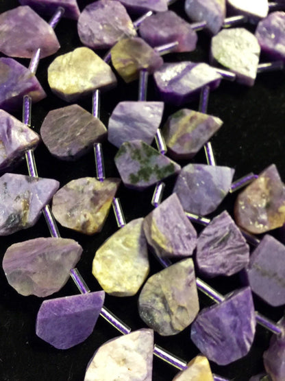 Natural Charoite beads teardrop shape 11x15mm natural Charoite gemstone color . Guaranteed 100% natural Charlotte bead . Full strand 15.5”