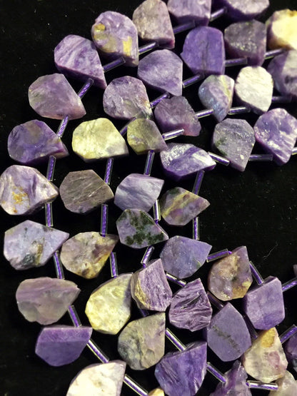 Natural Charoite beads teardrop shape 11x15mm natural Charoite gemstone color . Guaranteed 100% natural Charlotte bead . Full strand 15.5”