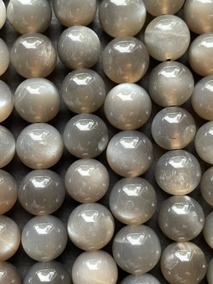 AAA Natural gray moonstone bead. 5mm, 6mm, 7mm, 8mm, 9mm, 10mm round stone bead. Beautiful natural rainbow flash on. Full strand 15.5”