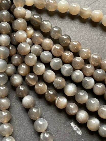 AAA Natural gray moonstone bead. 5mm, 6mm, 7mm, 8mm, 9mm, 10mm round stone bead. Beautiful natural rainbow flash on. Full strand 15.5”