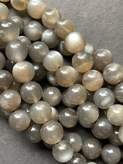 AAA Natural gray moonstone bead. 5mm, 6mm, 7mm, 8mm, 9mm, 10mm round stone bead. Beautiful natural rainbow flash on. Full strand 15.5”