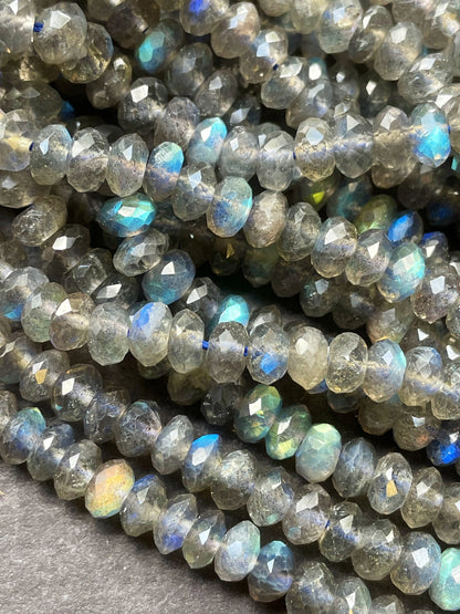 AA Natural blue flash labradorite stone bead . Faceted 3x4mm Rondelle Shape bead. Gorgeous gray color with beautiful blue flash full strand