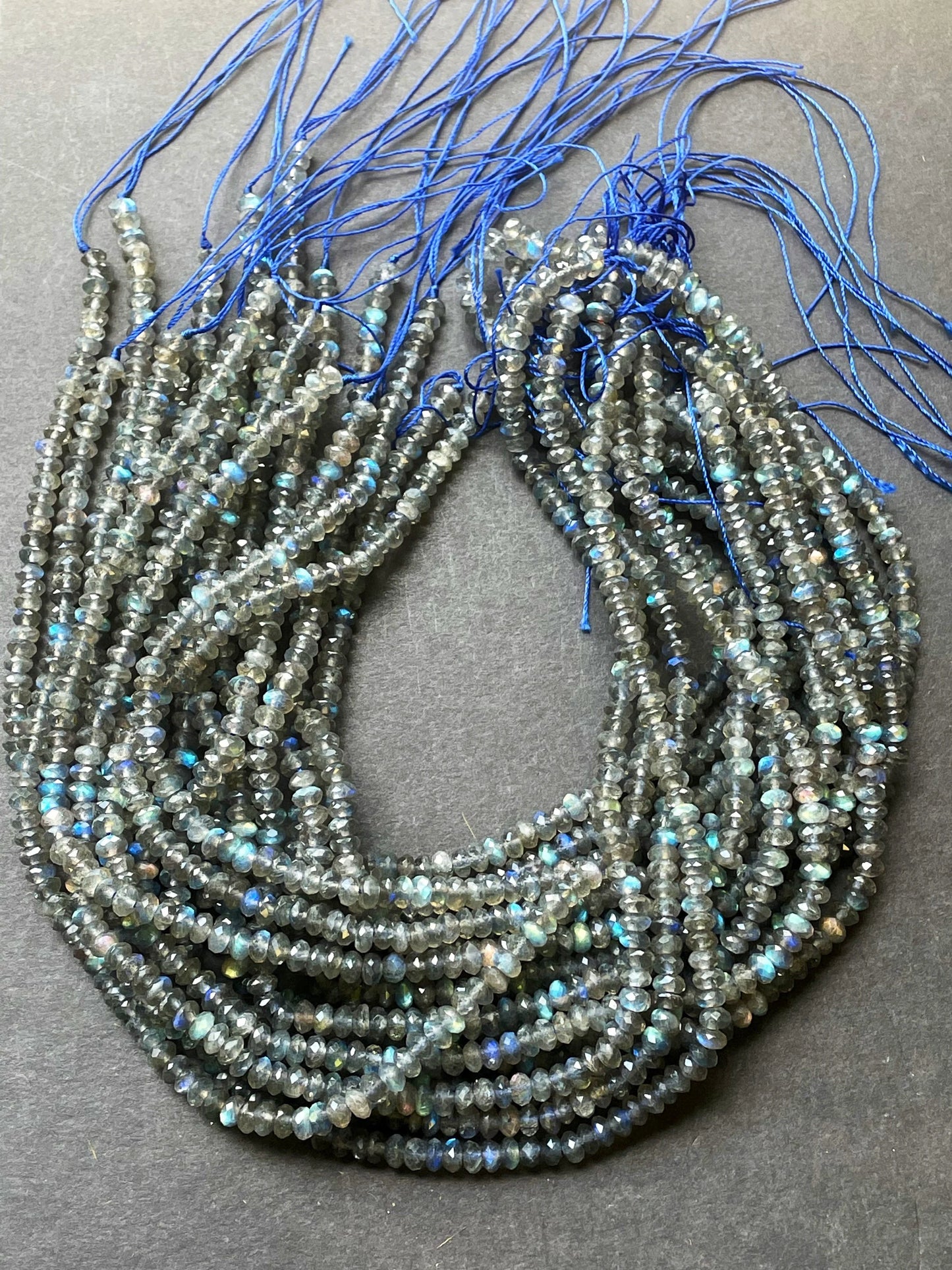 AA Natural blue flash labradorite stone bead . Faceted 3x4mm Rondelle Shape bead. Gorgeous gray color with beautiful blue flash full strand