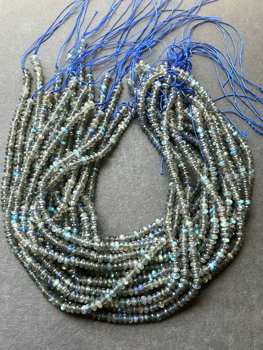 AA Natural blue flash labradorite stone bead . Faceted 3x4mm Rondelle Shape bead. Gorgeous gray color with beautiful blue flash full strand