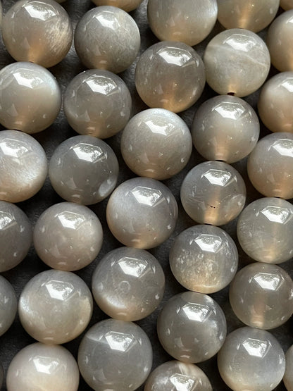AAA Natural gray moonstone bead. 5mm, 6mm, 7mm, 8mm, 9mm, 10mm round stone bead. Beautiful natural rainbow flash on. Full strand 15.5”